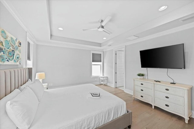 186 Ciboney St, Miramar Beach, FL 32550 - bedroom featuring light wood-type flooring, recessed lighting, a ceiling fan, visible vents, and a raised ceiling