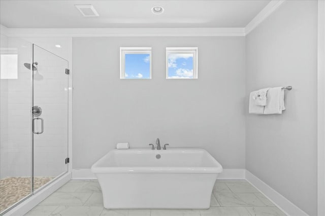 186 Ciboney St, Miramar Beach, FL 32550 - full bath featuring a freestanding bath, baseboards, a shower stall, and marble finish floor