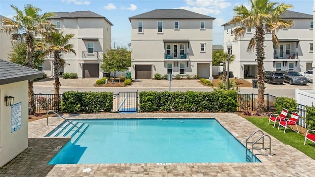 186 Ciboney St, Miramar Beach, FL 32550 - pool featuring a residential view and fence