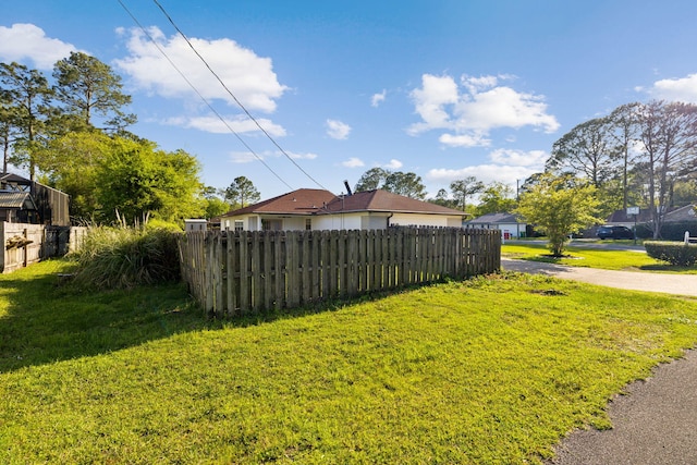 view of yard with fence