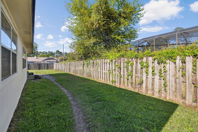 view of yard featuring a fenced backyard