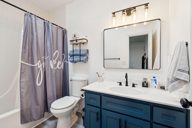full bathroom with toilet, vanity, and shower / tub combo with curtain