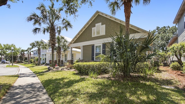 317 Turtle Cv, Panama City Beach, FL 32413 - view of home's exterior featuring a yard