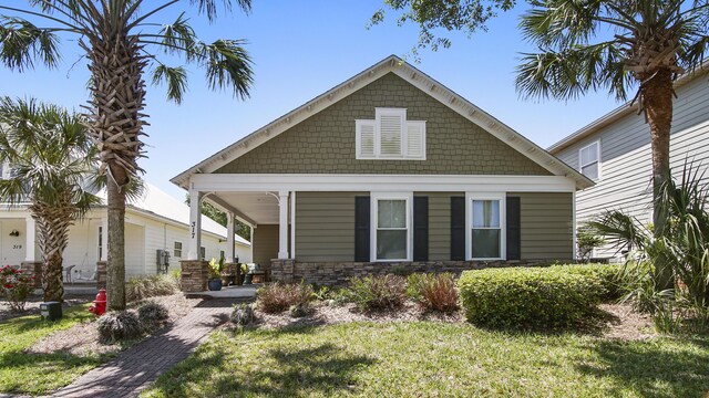 317 Turtle Cv, Panama City Beach, FL 32413 - back of property featuring stone siding