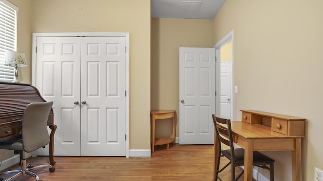 317 Turtle Cv, Panama City Beach, FL 32413 - office space with visible vents, light wood-type flooring, and baseboards