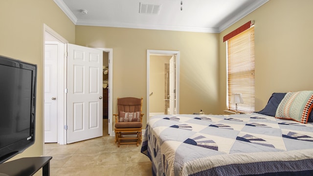 317 Turtle Cv, Panama City Beach, FL 32413 - bedroom with ornamental molding, visible vents, ensuite bathroom, and light tile patterned floors