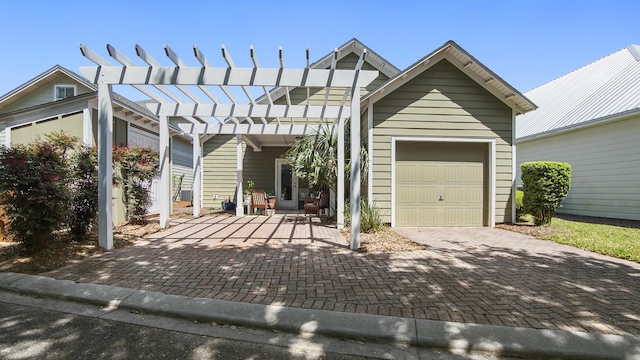317 Turtle Cv, Panama City Beach, FL 32413 - garage featuring decorative driveway