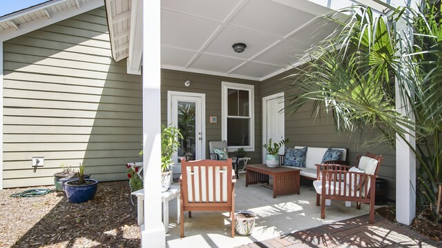 317 Turtle Cv, Panama City Beach, FL 32413 - view of patio / terrace with an outdoor living space