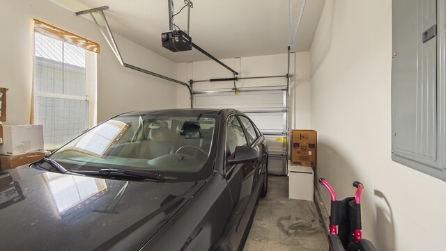 317 Turtle Cv, Panama City Beach, FL 32413 - garage with a garage door opener and electric panel