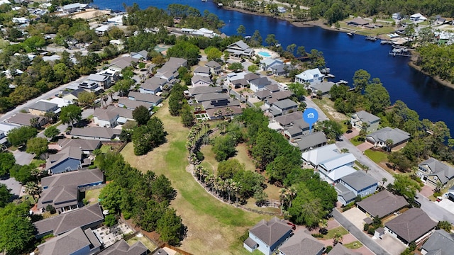 317 Turtle Cv, Panama City Beach, FL 32413 - drone / aerial view featuring a water view and a residential view