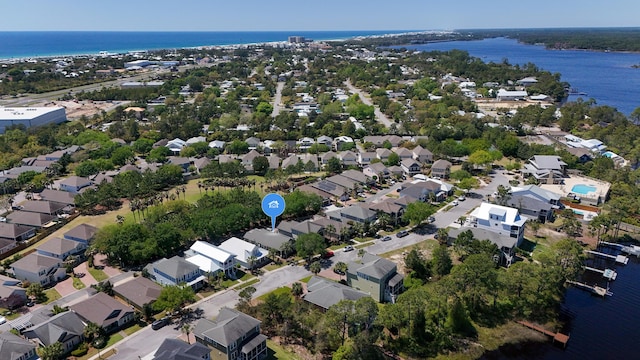 317 Turtle Cv, Panama City Beach, FL 32413 - birds eye view of property featuring a residential view and a water view