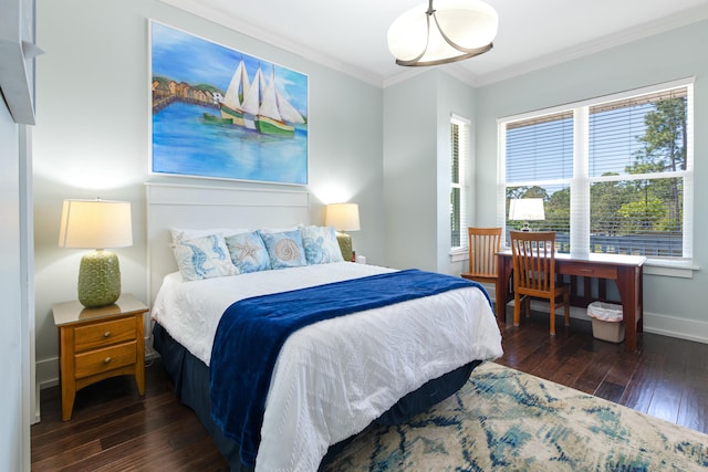 1158 Mack Bayou Rd, Santa Rosa Beach, FL 32459 - bedroom with crown molding, baseboards, and hardwood / wood-style flooring