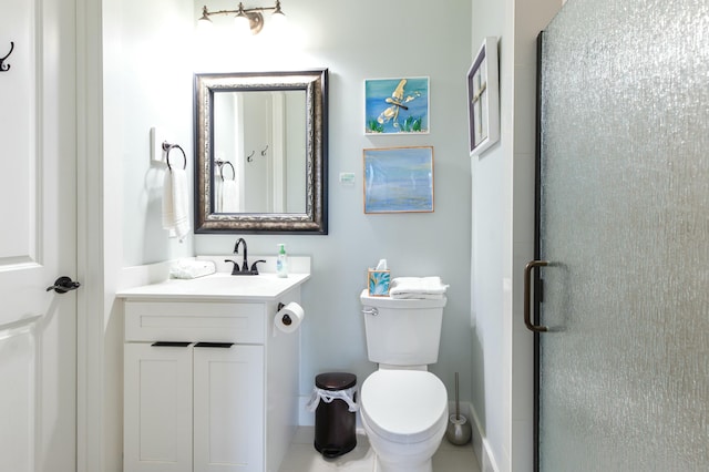 1158 Mack Bayou Rd, Santa Rosa Beach, FL 32459 - bathroom with toilet, vanity, a stall shower, and baseboards