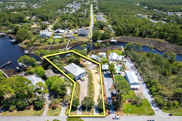 1158 Mack Bayou Rd, Santa Rosa Beach, FL 32459 - bird's eye view featuring a water view, a view of trees, and a residential view