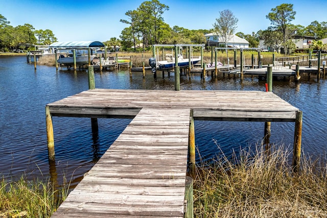 1158 Mack Bayou Rd, Santa Rosa Beach, FL 32459 - dock area featuring a water view and boat lift