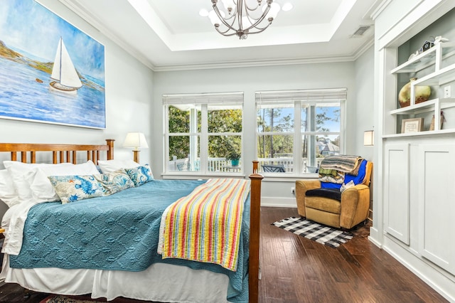 1158 Mack Bayou Rd, Santa Rosa Beach, FL 32459 - bedroom featuring visible vents, a tray ceiling, a notable chandelier, and hardwood / wood-style flooring
