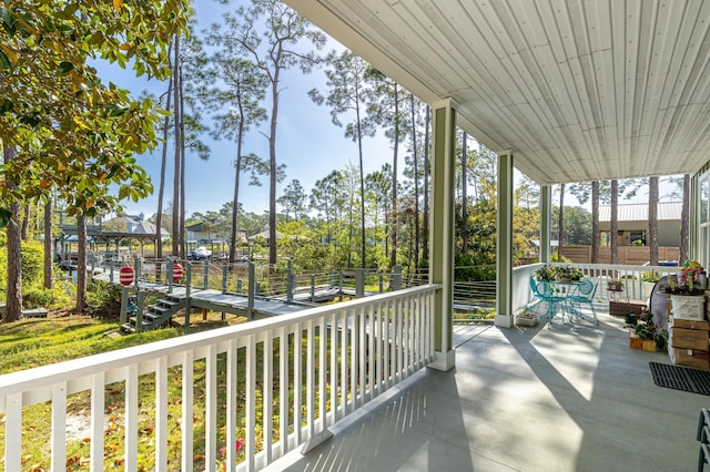 1158 Mack Bayou Rd, Santa Rosa Beach, FL 32459 - balcony featuring covered porch
