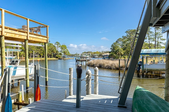 1158 Mack Bayou Rd, Santa Rosa Beach, FL 32459 - view of dock featuring a water view and boat lift