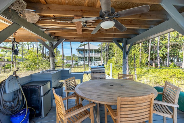 1158 Mack Bayou Rd, Santa Rosa Beach, FL 32459 - wooden terrace featuring a ceiling fan and area for grilling