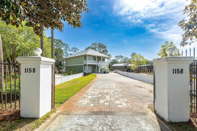 1158 Mack Bayou Rd, Santa Rosa Beach, FL 32459 - view of gate featuring a fenced front yard