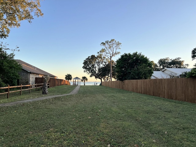 view of yard featuring fence