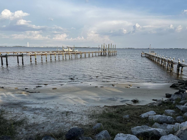 dock area featuring a water view