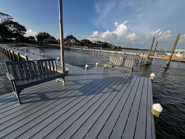 dock area with a water view