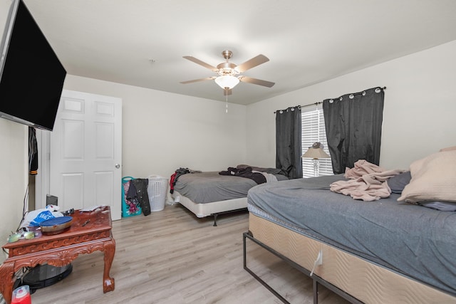 4010 Dancing Cloud Ct Unit 391, Destin, FL 32541 - bedroom with light wood-type flooring and a ceiling fan