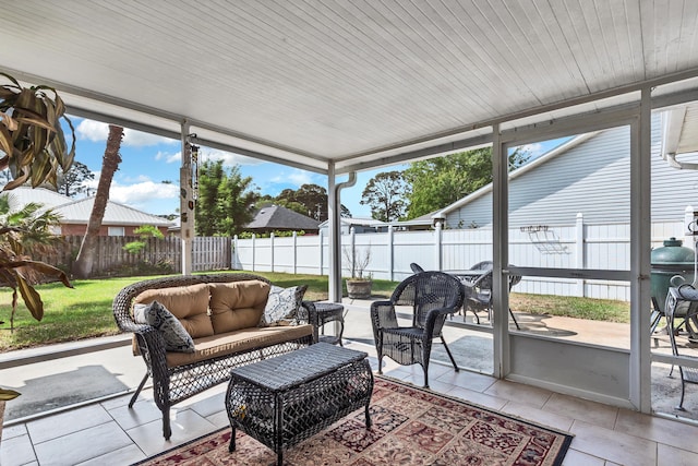 sunroom with an outdoor hangout area
