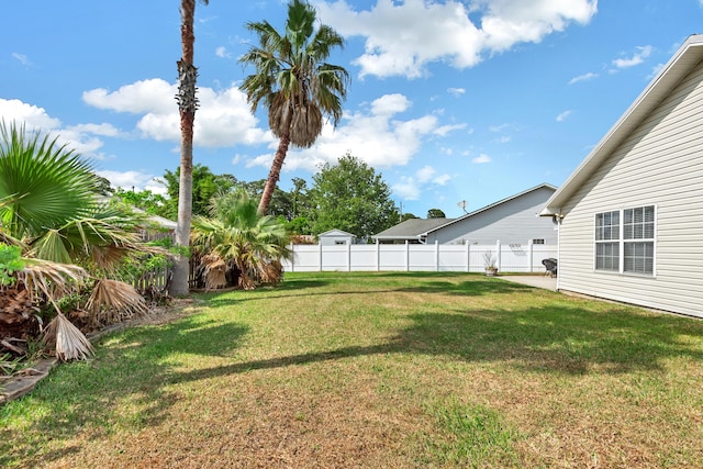 view of yard with fence