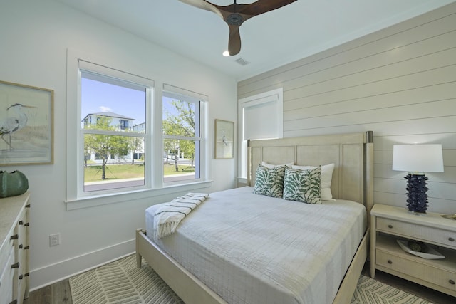 80 Sea Croft Dr, Santa Rosa Beach, FL 32459 - bedroom featuring a ceiling fan, baseboards, visible vents, and wood finished floors