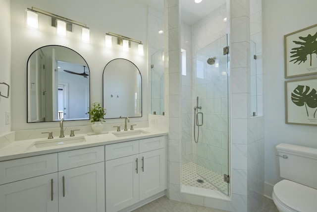 80 Sea Croft Dr, Santa Rosa Beach, FL 32459 - full bath with double vanity, toilet, a sink, and a stall shower
