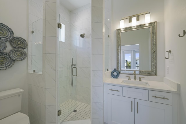 80 Sea Croft Dr, Santa Rosa Beach, FL 32459 - full bathroom with vanity, plenty of natural light, a shower stall, and toilet