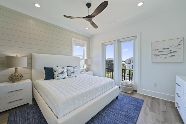 80 Sea Croft Dr, Santa Rosa Beach, FL 32459 - bedroom with recessed lighting, access to exterior, and wood finished floors