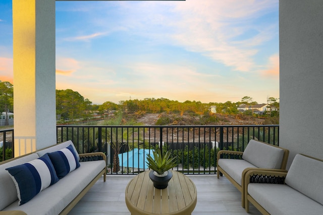 80 Sea Croft Dr, Santa Rosa Beach, FL 32459 - balcony at dusk featuring an outdoor hangout area