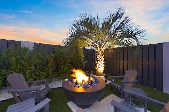 80 Sea Croft Dr, Santa Rosa Beach, FL 32459 - view of patio with an outdoor fire pit and fence