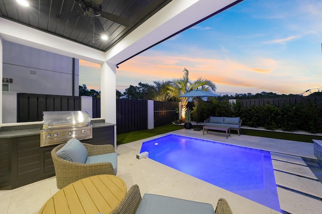 80 Sea Croft Dr, Santa Rosa Beach, FL 32459 - view of swimming pool with ceiling fan, a fenced backyard, an outdoor kitchen, an outdoor living space, and area for grilling