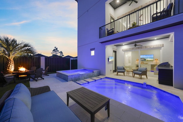 80 Sea Croft Dr, Santa Rosa Beach, FL 32459 - view of pool featuring exterior kitchen, ceiling fan, a patio, and an outdoor living space with a fire pit