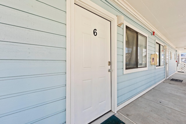 property entrance with a porch