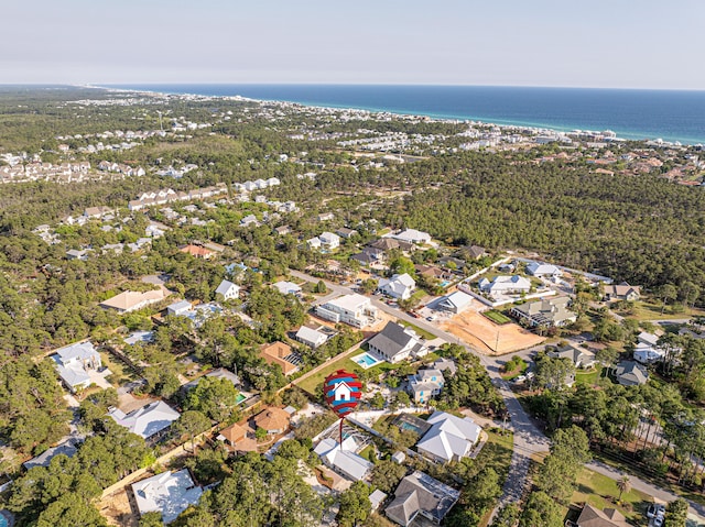 34 Debbie Ln, Santa Rosa Beach, FL 32459 - aerial overview of property's location with nearby suburban area and a large body of water