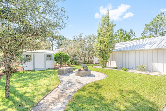 34 Debbie Ln, Santa Rosa Beach, FL 32459 - view of green lawn featuring an outdoor fire pit