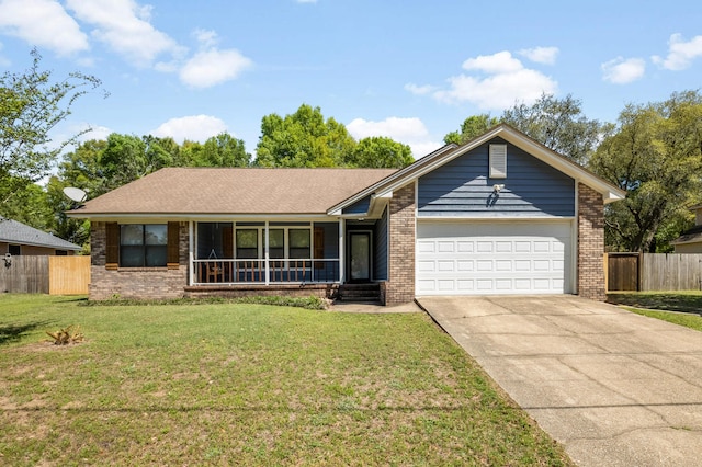single story home featuring an attached garage, concrete driveway, fence, and a front lawn