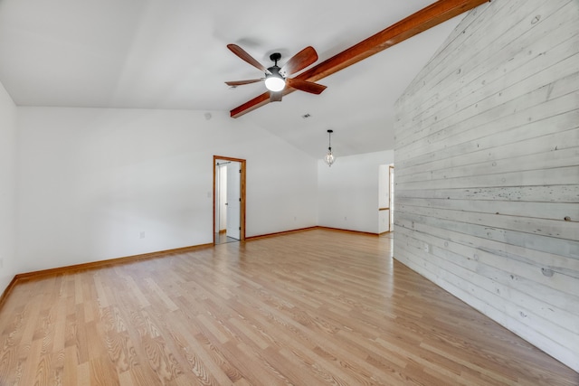 4651 Browning Ct, Crestview, FL 32539 - interior space featuring light wood-style flooring, ceiling fan, lofted ceiling with beams, and baseboards