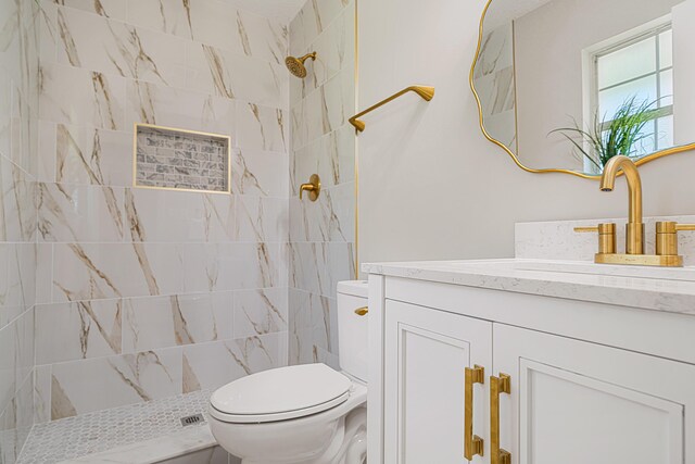 2899 Wisteria Ave, Crestview, FL 32539 - full bathroom with vanity, toilet, and a tile shower