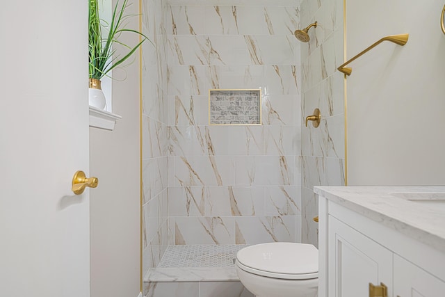 2899 Wisteria Ave, Crestview, FL 32539 - bathroom with vanity, toilet, and a tile shower