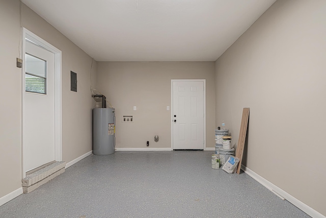 2899 Wisteria Ave, Crestview, FL 32539 - garage featuring electric water heater and baseboards