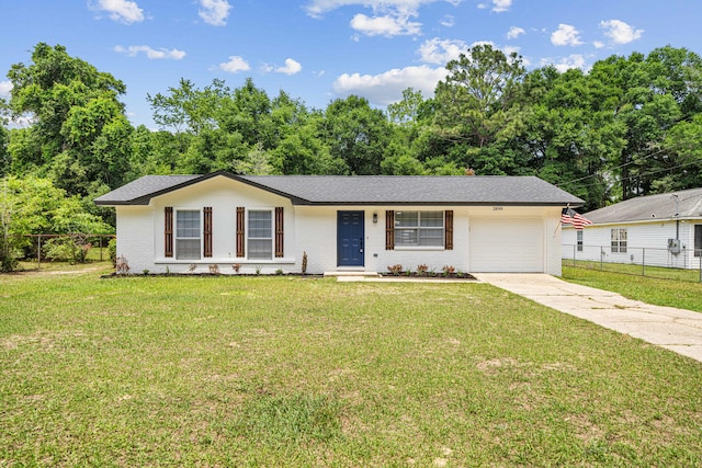 2899 Wisteria Ave, Crestview, FL 32539 - single story home with an attached garage, concrete driveway, brick siding, and a shingled roof