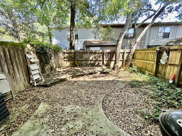 view of yard featuring a fenced backyard