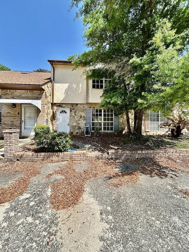 view of front of property featuring stucco siding