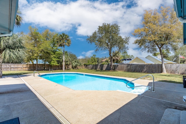 809 Main St, Destin, FL 32541 - view of swimming pool featuring a patio, a yard, and a fenced backyard